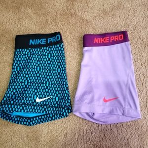 2 pairs medium Nike spandex shorts